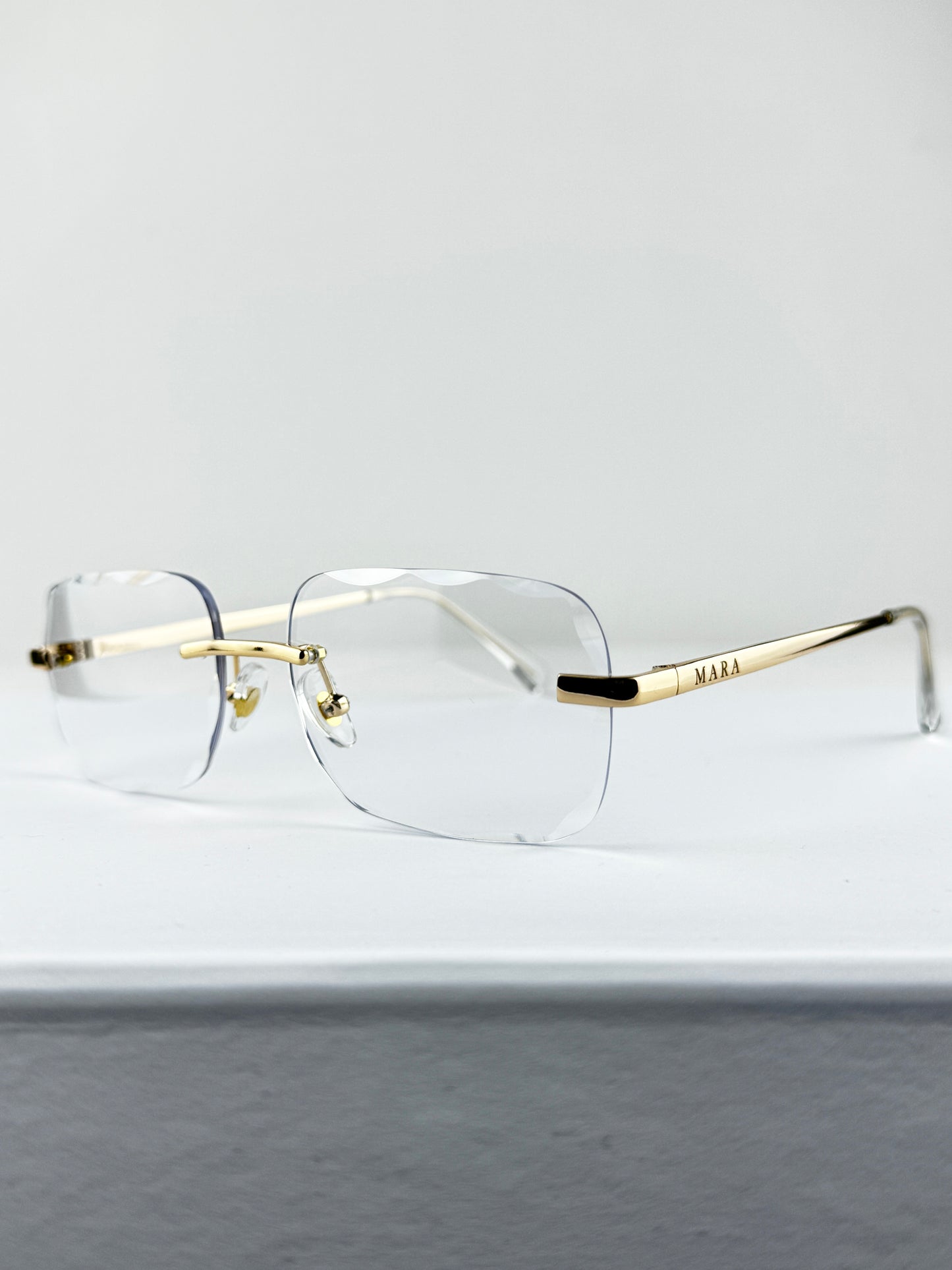 RIMLESS GOLD