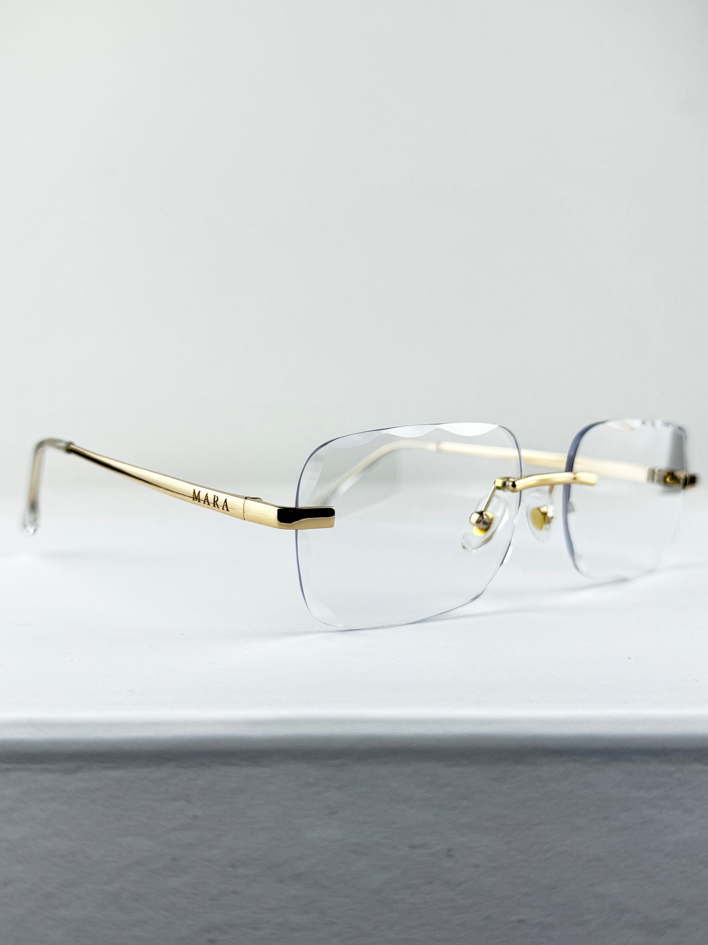 RIMLESS GOLD